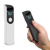 Thermometer showing forehead and surface measuring modes